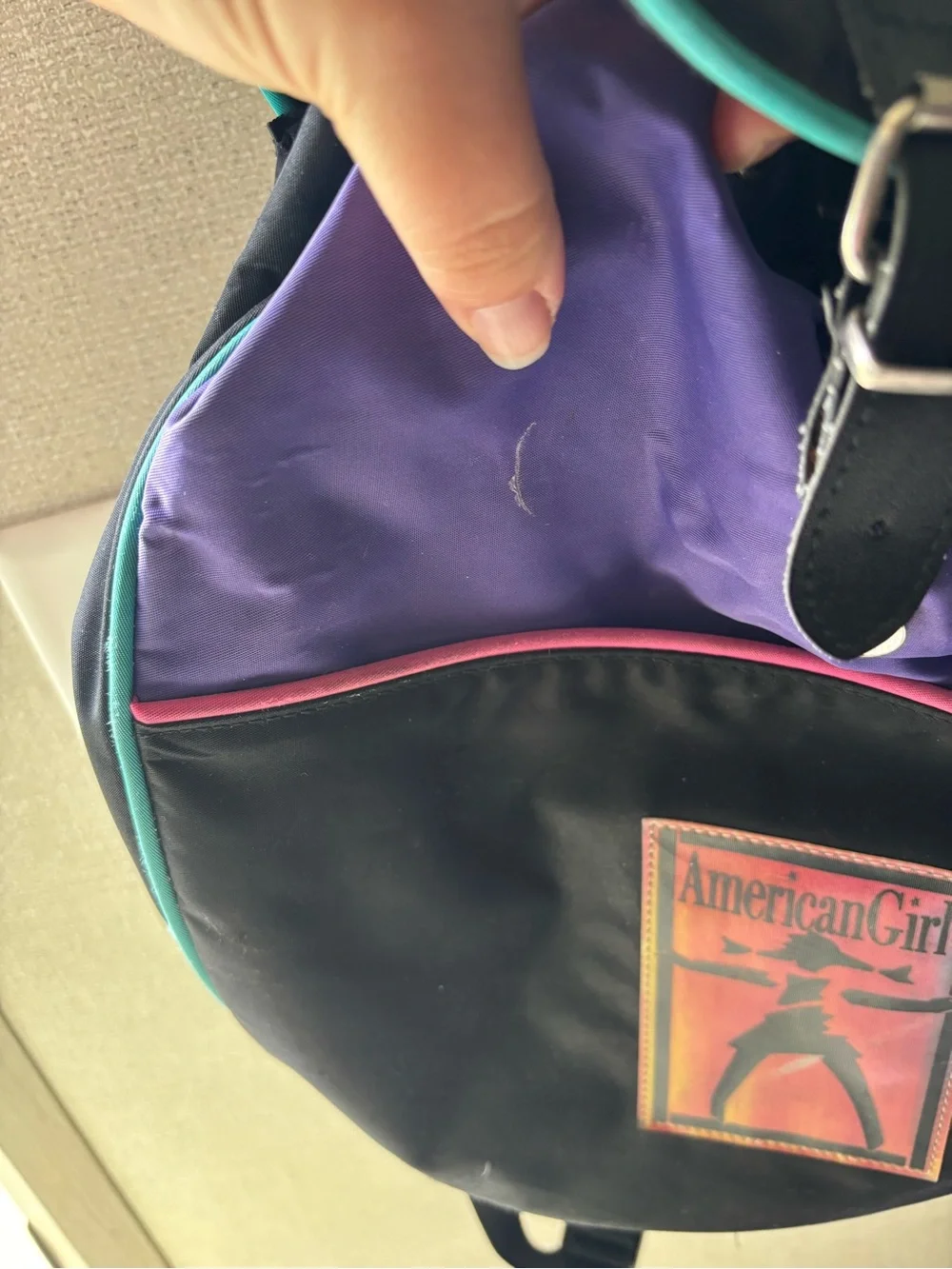 American Girl Black Backpack with Purple and Teal Accents